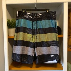 Billabong board shorts. Size 29. Excellent condition. Back pocket. Waterproof.